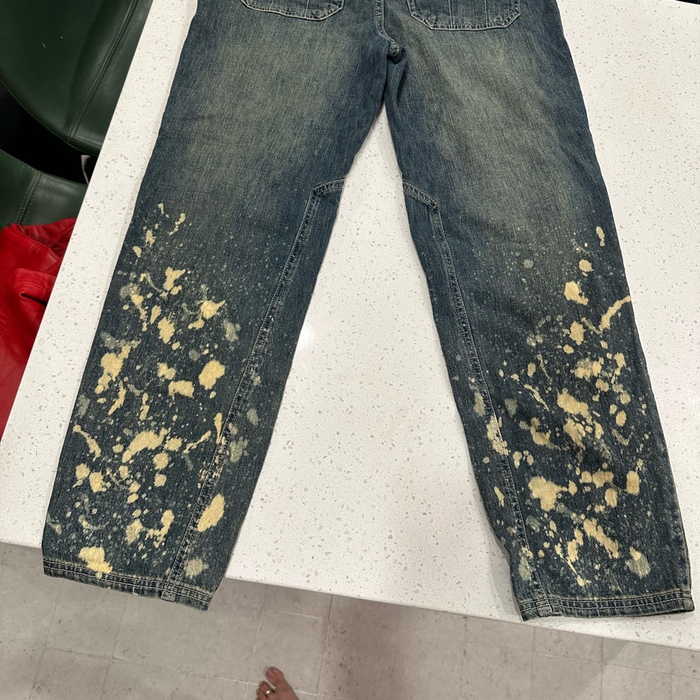 Anthropologie Blue Jeans with Tan Splatter Design